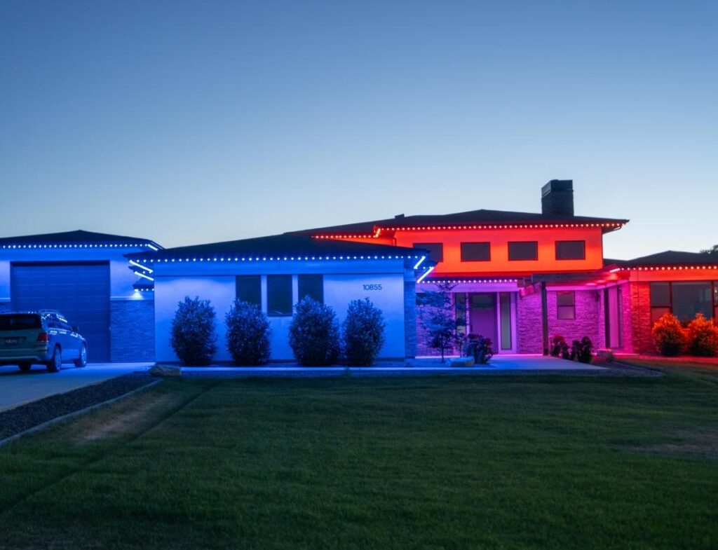 Permanent outdoor lighting installed along a Rochester NY roofline